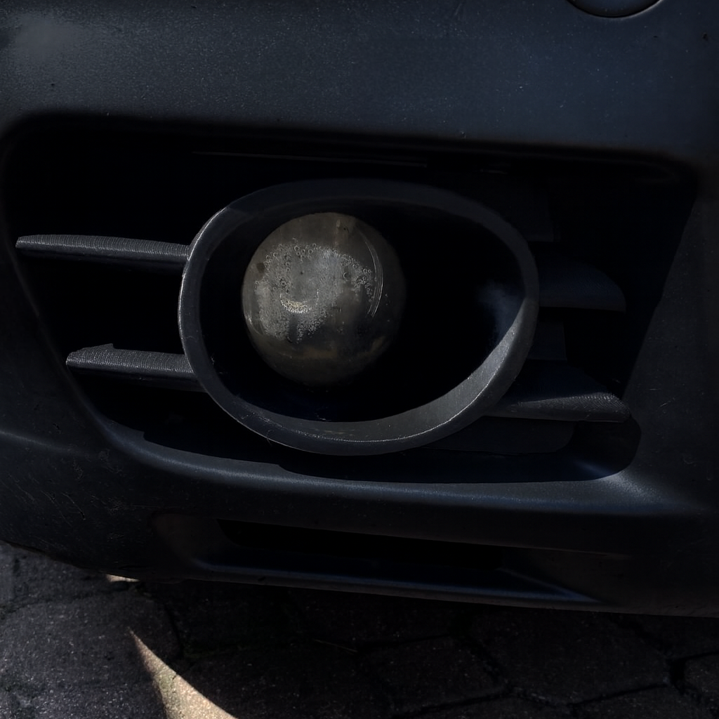 Opel Astra G fog light bezel