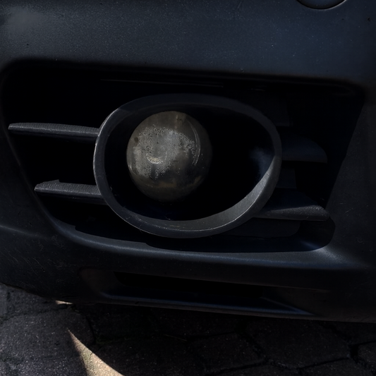 Opel Astra G fog light bezel